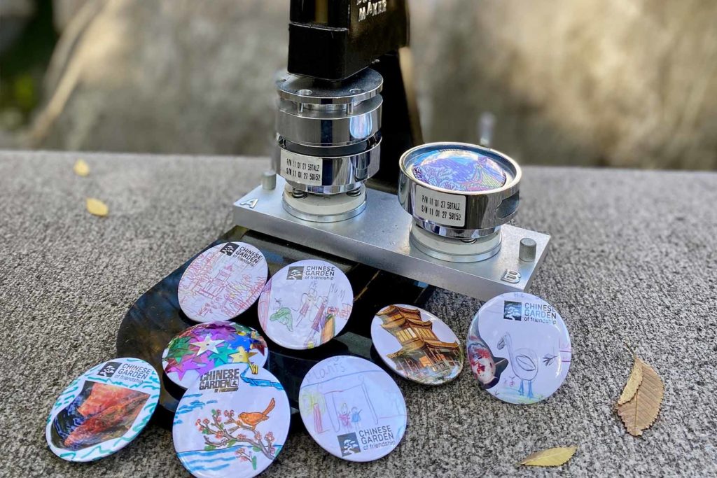 This picture shows a button makes and some finished buttons.